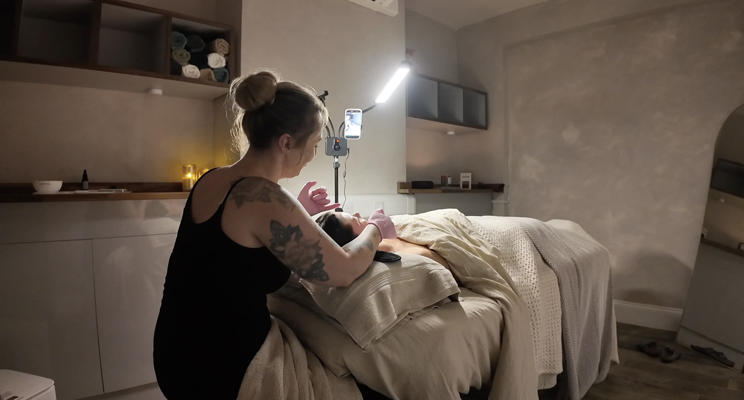 Sarah treating a client at Canopy Skin & Wellness Studio